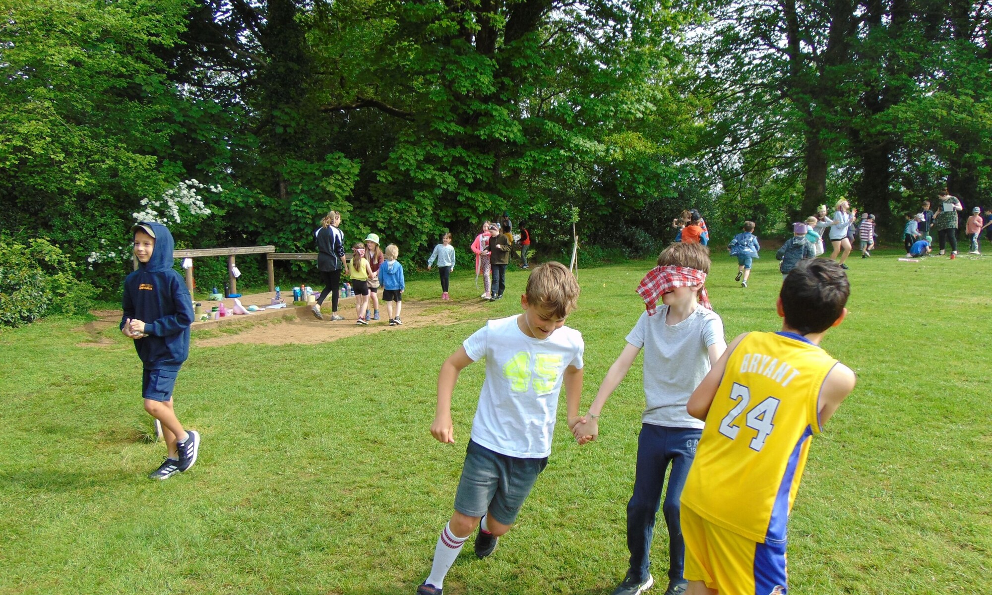 St Peter's Church of England Junior School pupils playing on the school field